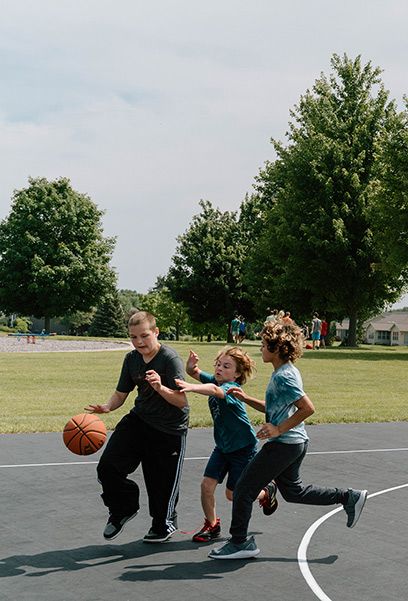 Children playing basketball